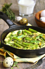Omelet  with asparagus bean and thyme.