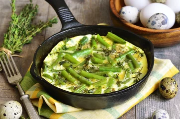 Foto op Aluminium Spiegeleieren Omelet  with asparagus bean and thyme.