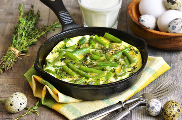 Omelet  with asparagus bean and thyme.