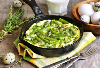 Omelet  with asparagus bean and thyme.