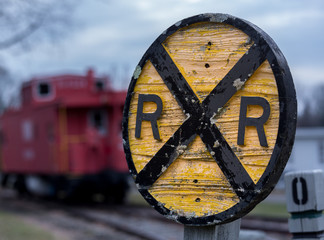 Old wooden railroad RR sign with caboose