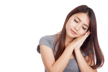 Fototapeta premium Young Asian woman posing gesturing sleeping