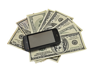 Современный смартфон лежащий на долларах