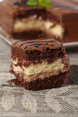 A chocolate fudge layer cake. Selective focus.