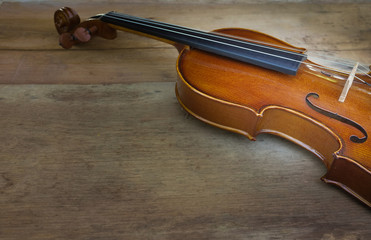 Fototapeta na wymiar Classic violin vintage on wood background
