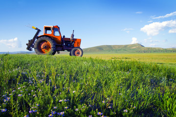 Side View Of A Tractor In A Scenic View