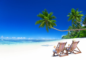Couple Relaxing on the Tropical Beach