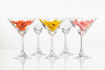 Five glasses of champagne and golf equipments