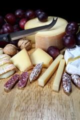 Exquisite mold cheeses on a black background