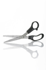 Small Scissors With Reflection In Studio