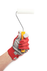 Hand holding a paint roller