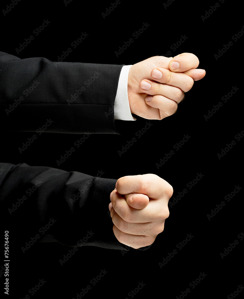 Wall mural caucasian male hand in a business suit isolated