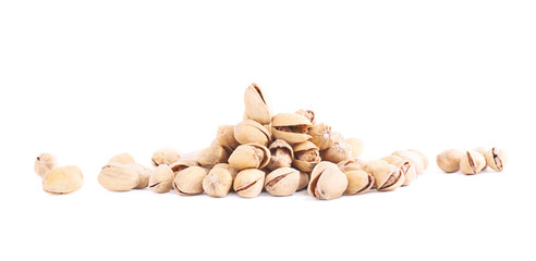 Pile of multiple pistachios isolated