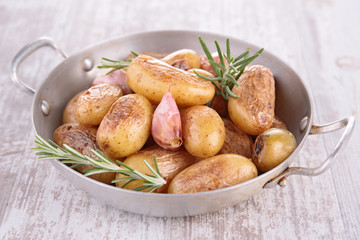 baked potato with garlic and rosemary