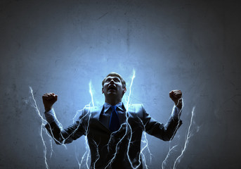 Businessman with lightning