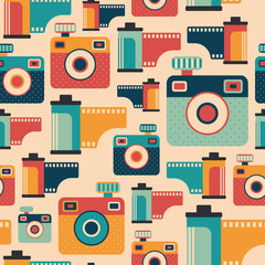 Seamless pattern with colorful retro cameras and films.