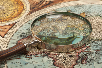 Fototapeta na wymiar Magnifying glass and map