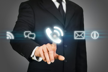 Businessman clicking on call icon.