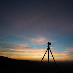 silhouette of camera on tripod