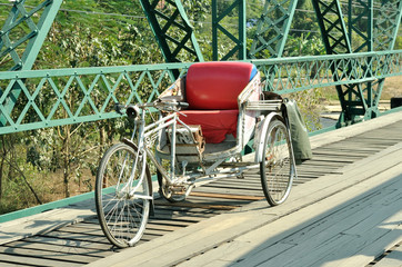 Fototapeta na wymiar Traditional old rickshaw three-wheeler