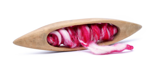 Old shuttle antique with wool