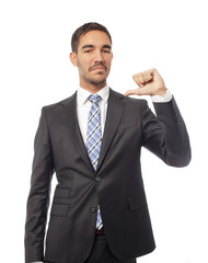 Satisfied businessman pointing