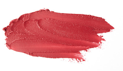 Red colour lipstick stroke on white paper