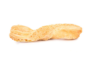 Stick cracker with sesame seeds.