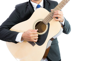Fototapeta na wymiar Businessman playing guitar isolate