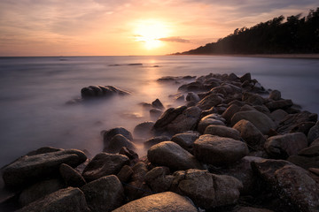 Beautiful sunset at the stone beach