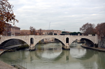 Rome, Italy. View on a bridge across the Tiber on a cloudy day