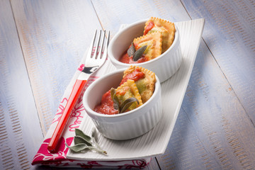 fried ravioli with tomatoes sauce