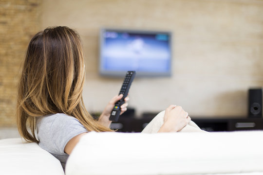 Young Woman Watching TV