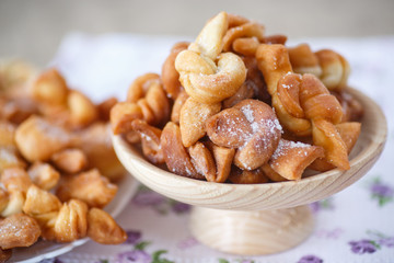 sweet pastry deep fried and sprinkled
