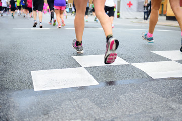 Runners crossing start or finish line