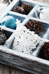 Christmas card with cones and balls, selective focus