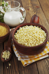 Millet porridge  in a ceramic pot