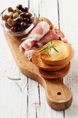Traditional italian antipasto with prosciutto,