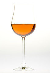 wineglass with rosé wine
