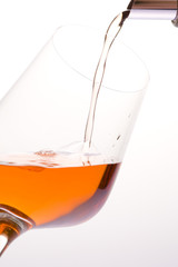 wineglass with rosé wine
