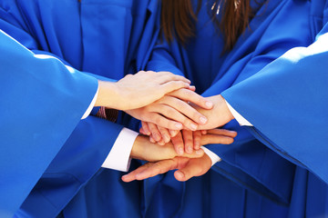 Graduate students hands close-up
