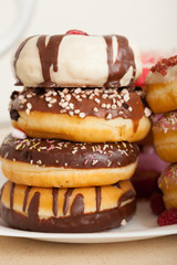tasty donuts on  plate.