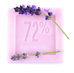 Bar of natural soap with fresh lavender isolated on white