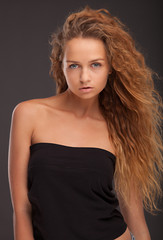 Fototapeta premium Attractive fashionable young brunette woman.