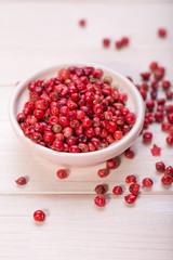 Red pepper, peppercorns in bowl. hot spices 