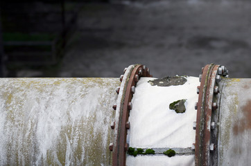 The flanges and old metal constructions in industrial zone © northernland