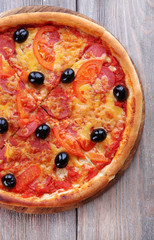 Delicious Italian pizza with black olives