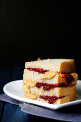 Tasty sandwich with jam and peanut butter