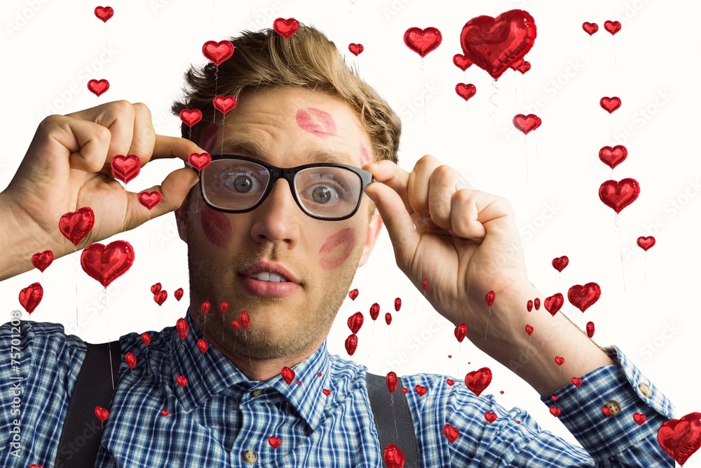 Aufkleber composite image of geeky hipster covered in kisses