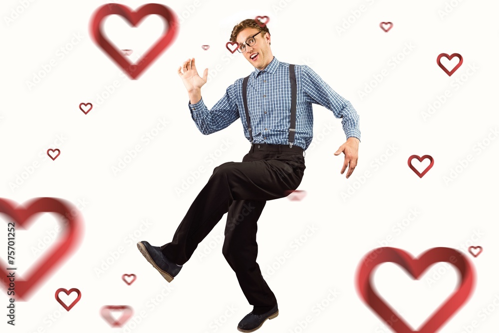 Poster Composite image of geeky hipster walking and looking at camera